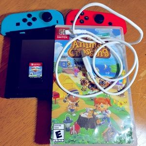 Nintendo Switch. Blue/Red. 32GB. Animal Crossing game, and charging cord.